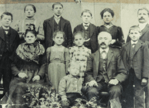 Old-fashioned family portrait with multiple generations