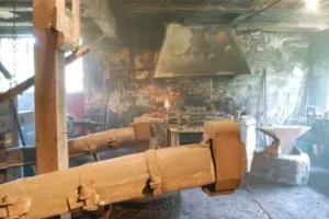 Rustic blacksmith forge with anvil and bellows