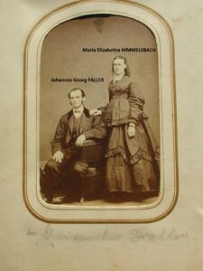 Sepia Victorian couple portrait, man seated, woman standing