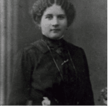 Portrait of woman in high-collar dark dress