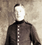 Sepia portrait of young soldier in uniform