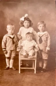 Sepia portrait of children in sailor outfits