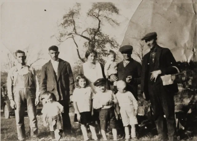 Vintage multi-generational family portrait outdoors