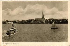 Vintage lakeside town with steepled church