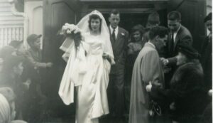 Vintage wedding: bride and groom leaving church