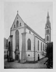 Historic Gothic church with tall pointed steeple