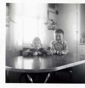 Vintage photo of two boys at table
