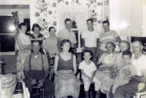Vintage multigenerational family gathered in kitchen