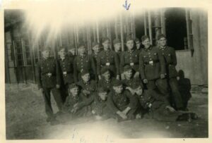 Vintage black-and-white group of uniformed soldiers