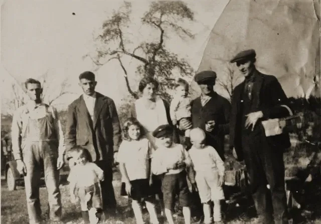 Vintage multi-generational family portrait outdoors